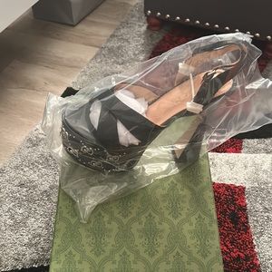 Black and sliver Gucci Embellished Leather Platform shoes